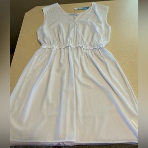Women’s white dress. New with tags. Size large.